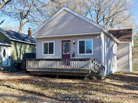 This property features a cozy living room, an updated kitchen, and a dining area perfect for entertaining. . Houses for rent in muskegon mi